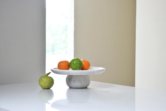 Fruits on stunning white marble stand 