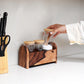 Wooden kitchen organizer with jars to organise salt and spices 

